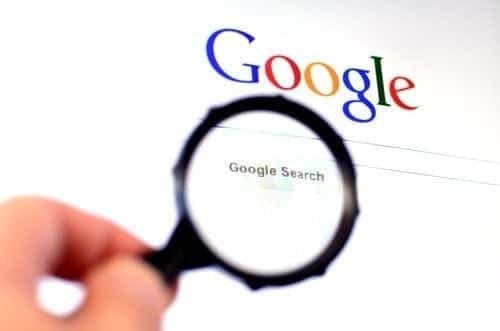 google search page and magnifying glass